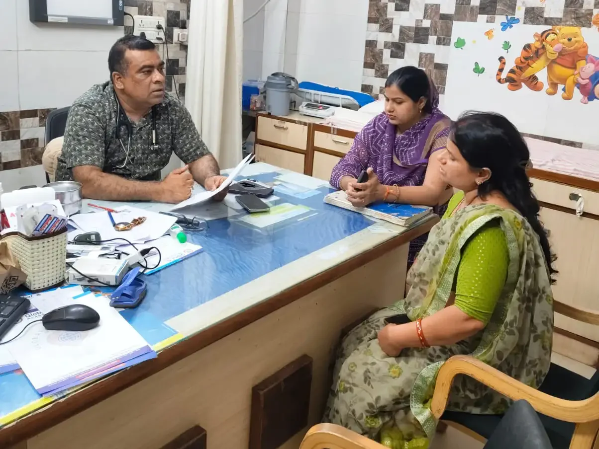 Dr Rizwan with patient